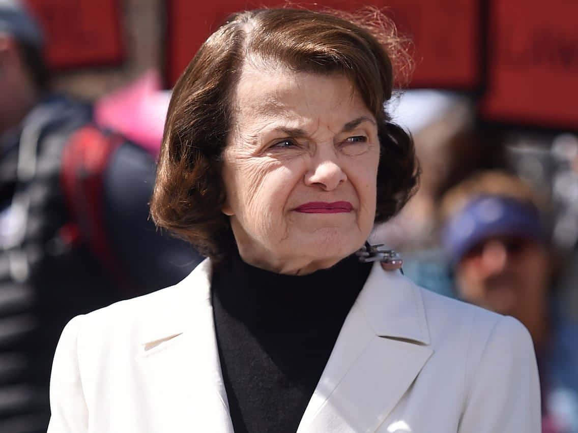 Dianne Feinstein Wearing White Suit Background