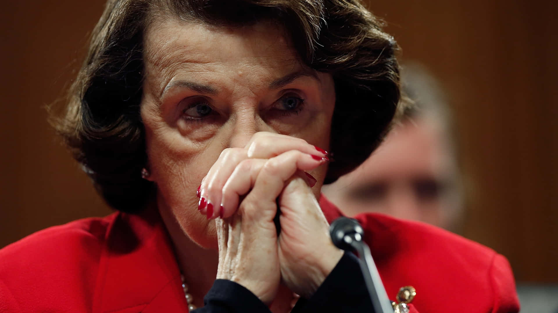 Dianne Feinstein With Hands Clasped Background
