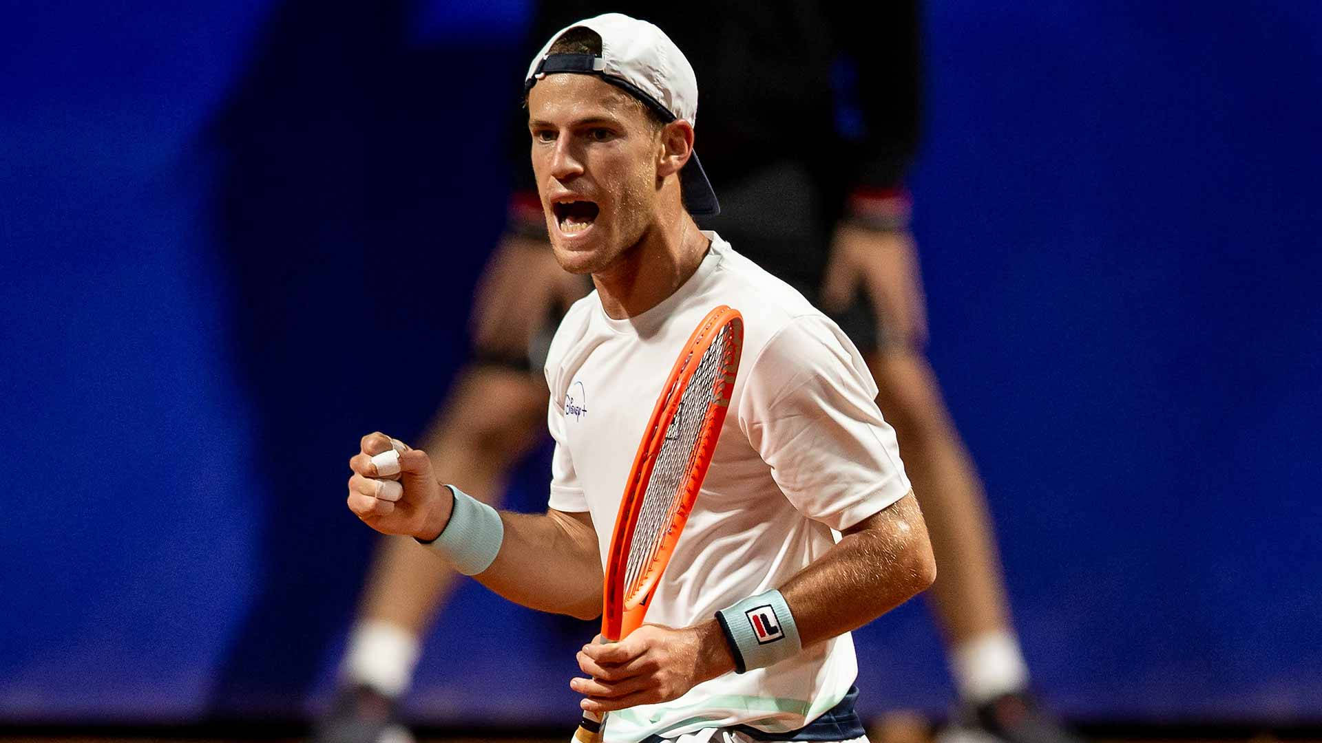 Diego Schwartzman And His Orange Racket Background