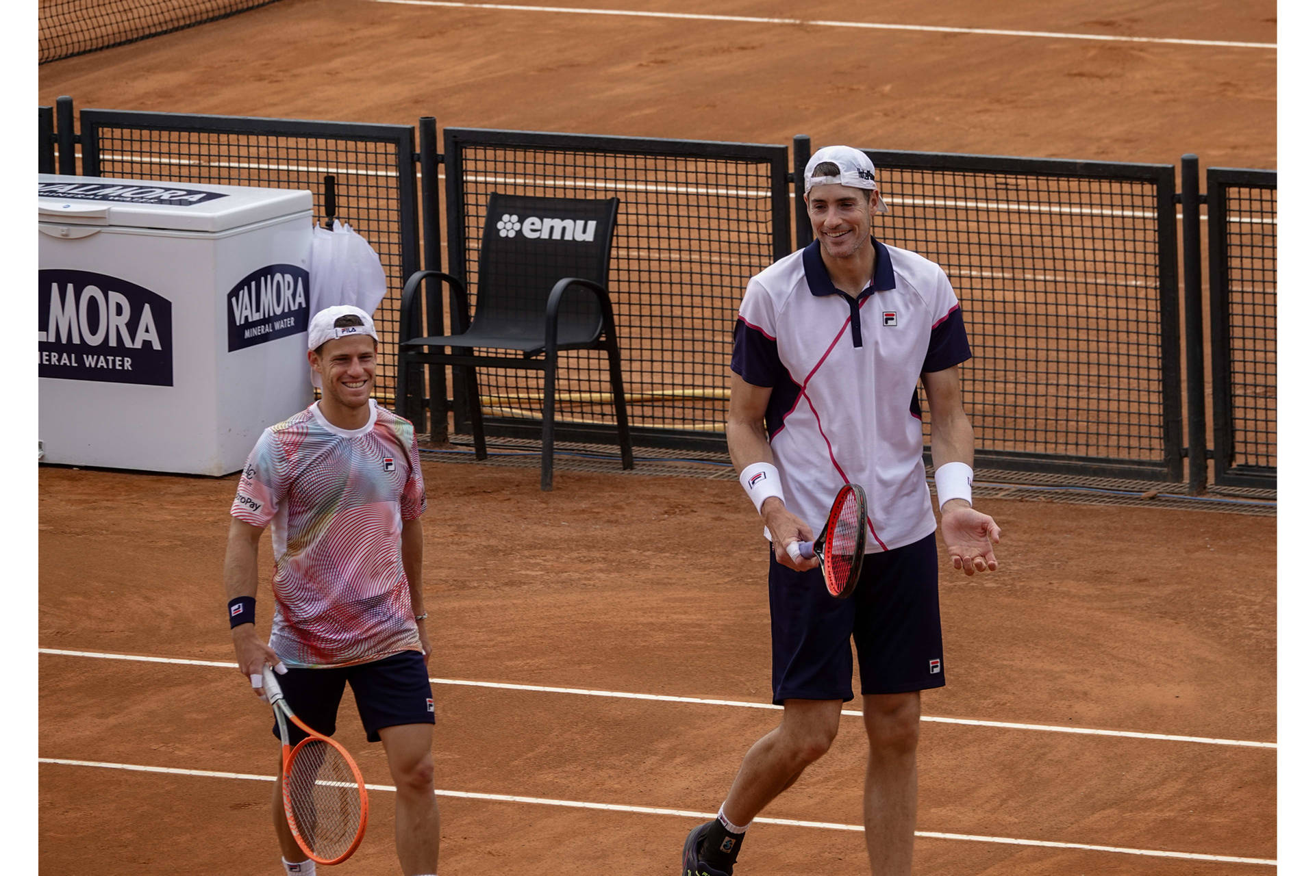 Diego Schwartzman And John Isner Background