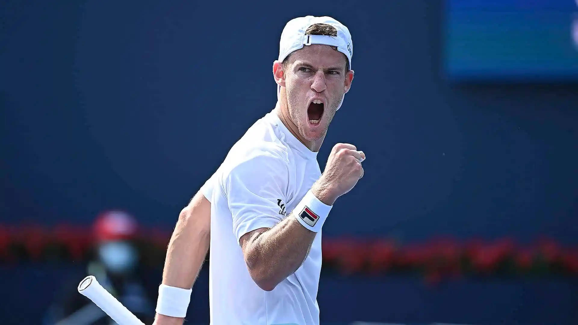 Diego Schwartzman Celebrates His Victory On The Tennis Court Background