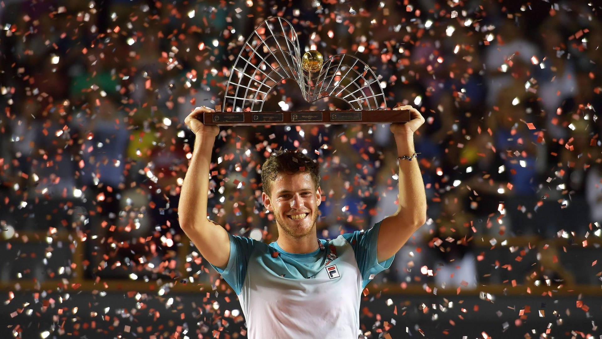 Diego Schwartzman Holding Trophy Background