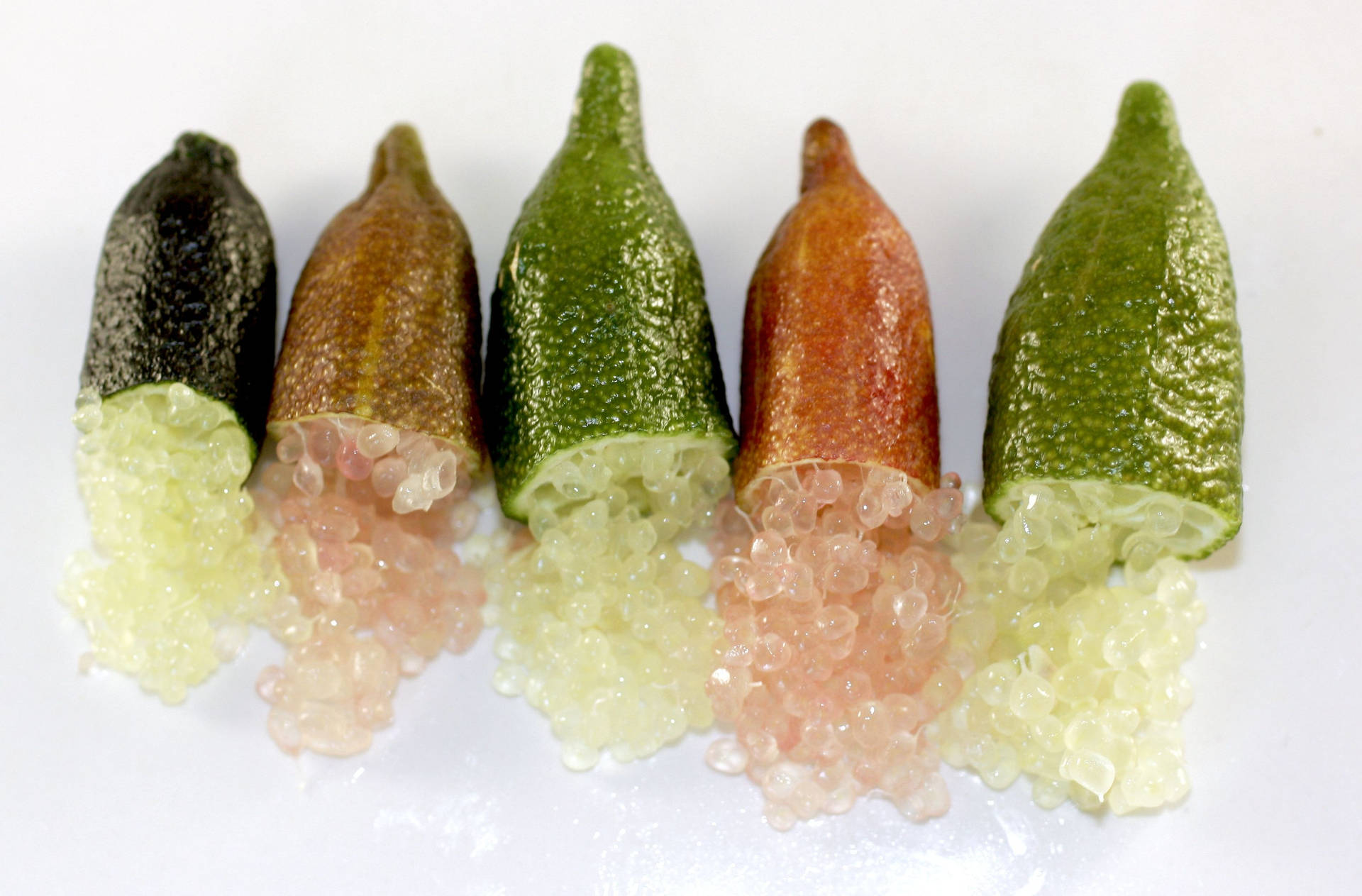 Different Colors Of Finger Lime Fruit Background