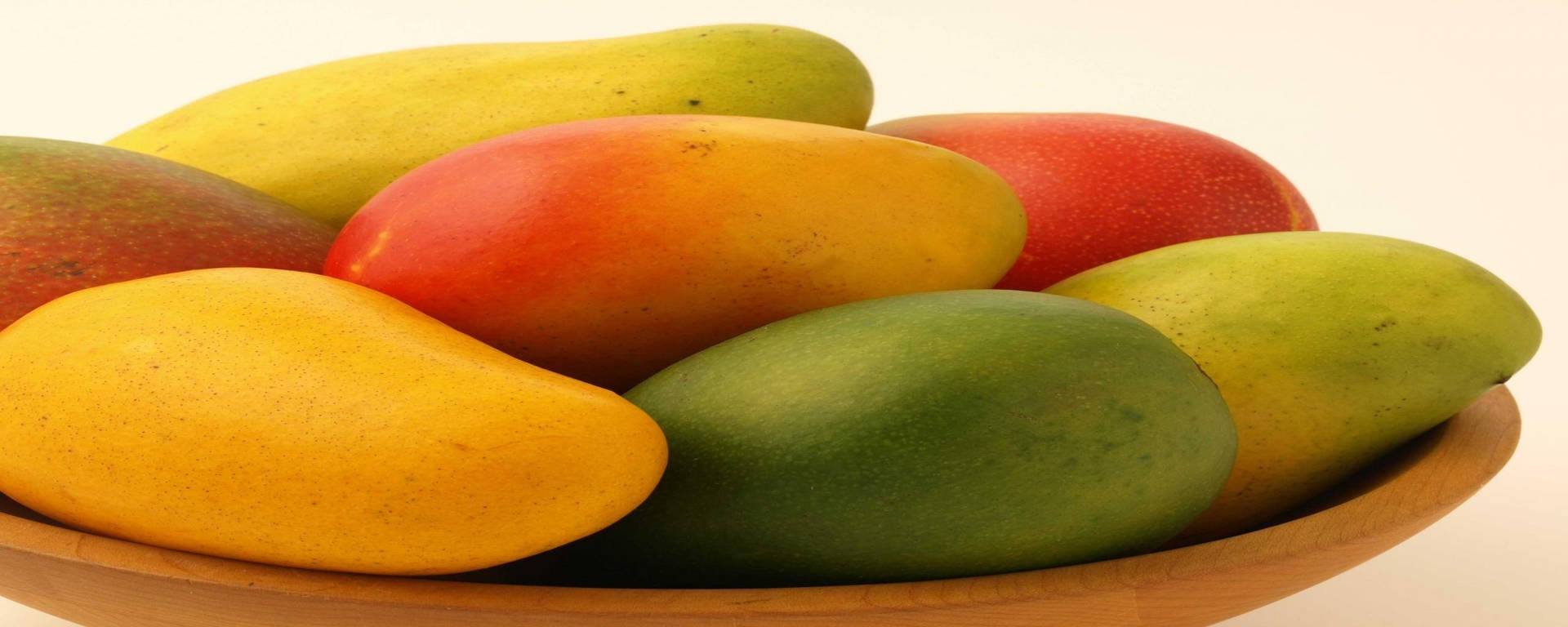 Different Colors Of Mango Fruits Background