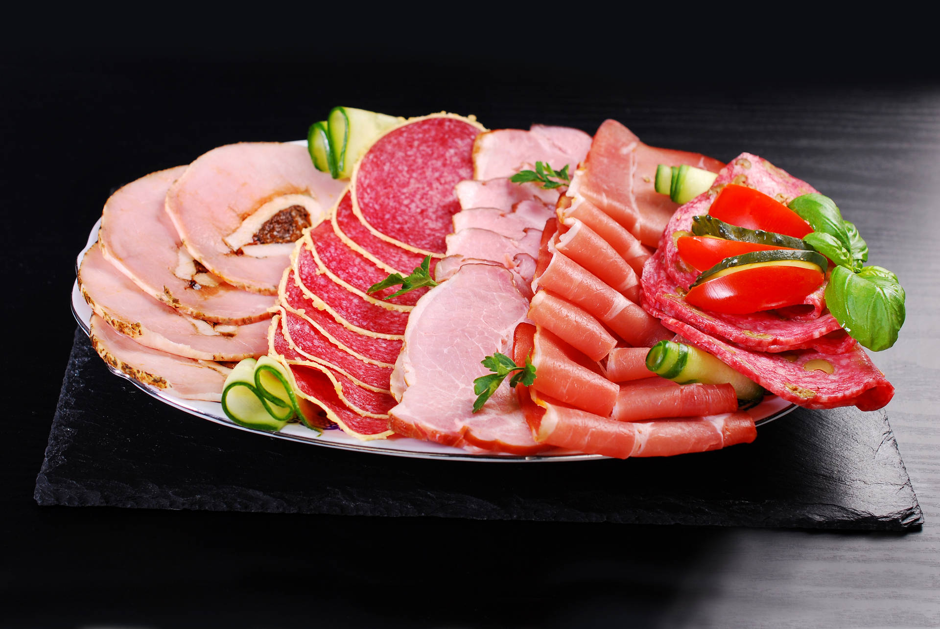 Different Lunch Meat On Plate Background