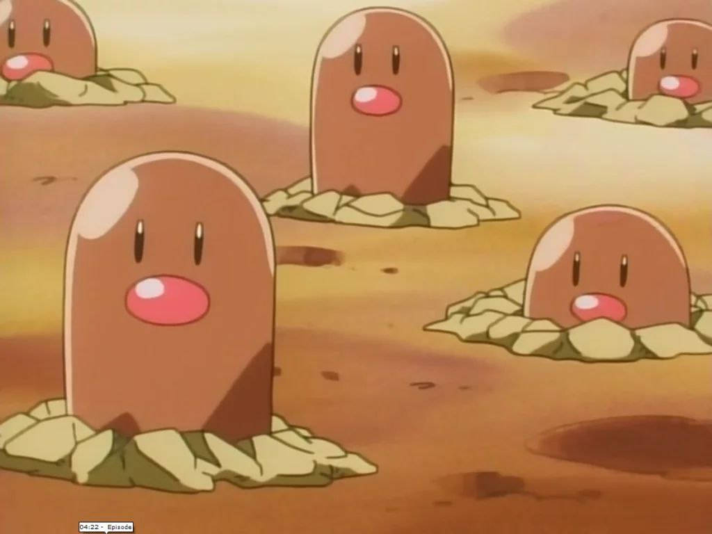 Diglett From Pokémon In Desert Ground Background