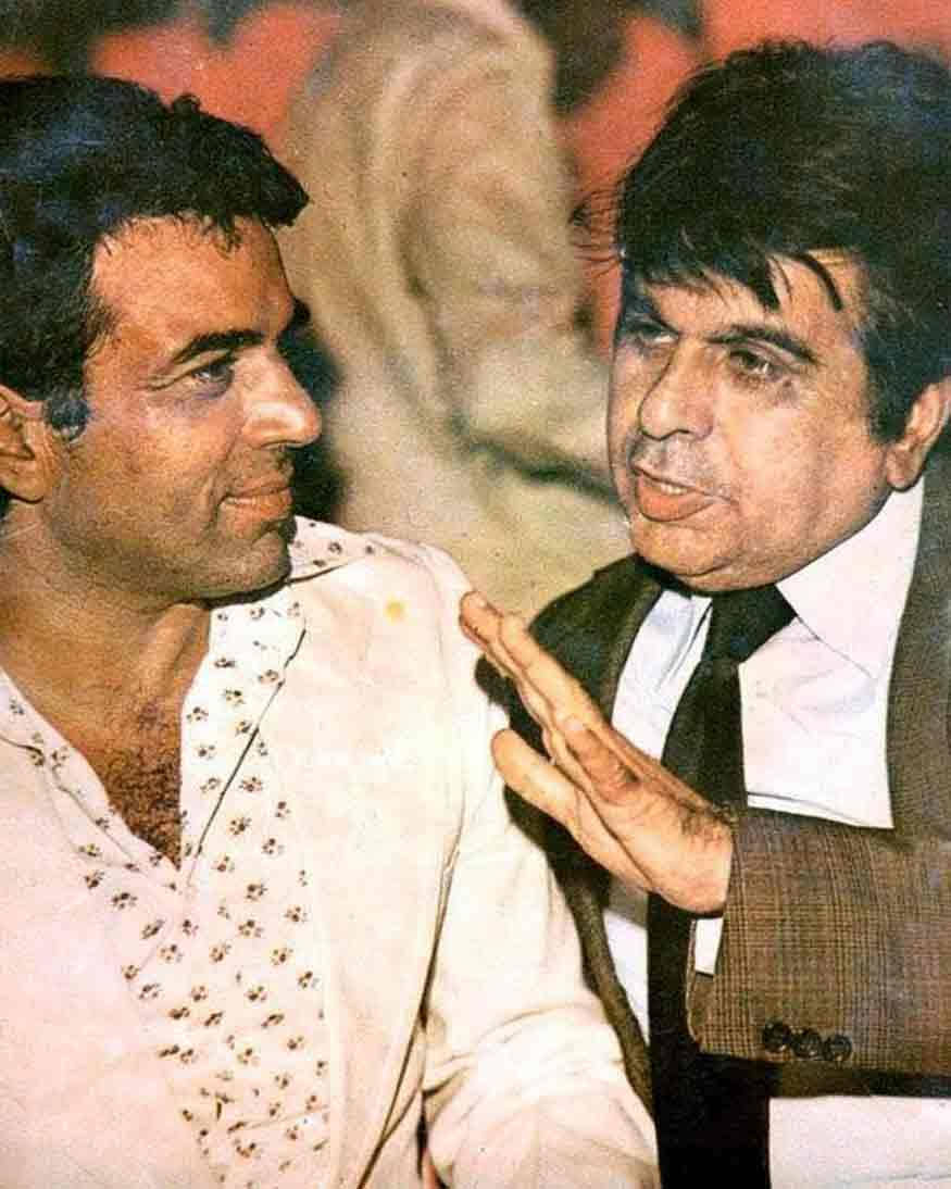 Dilip Kumar And Dharmendra Posed For A Classic Bollywood Photograph Background