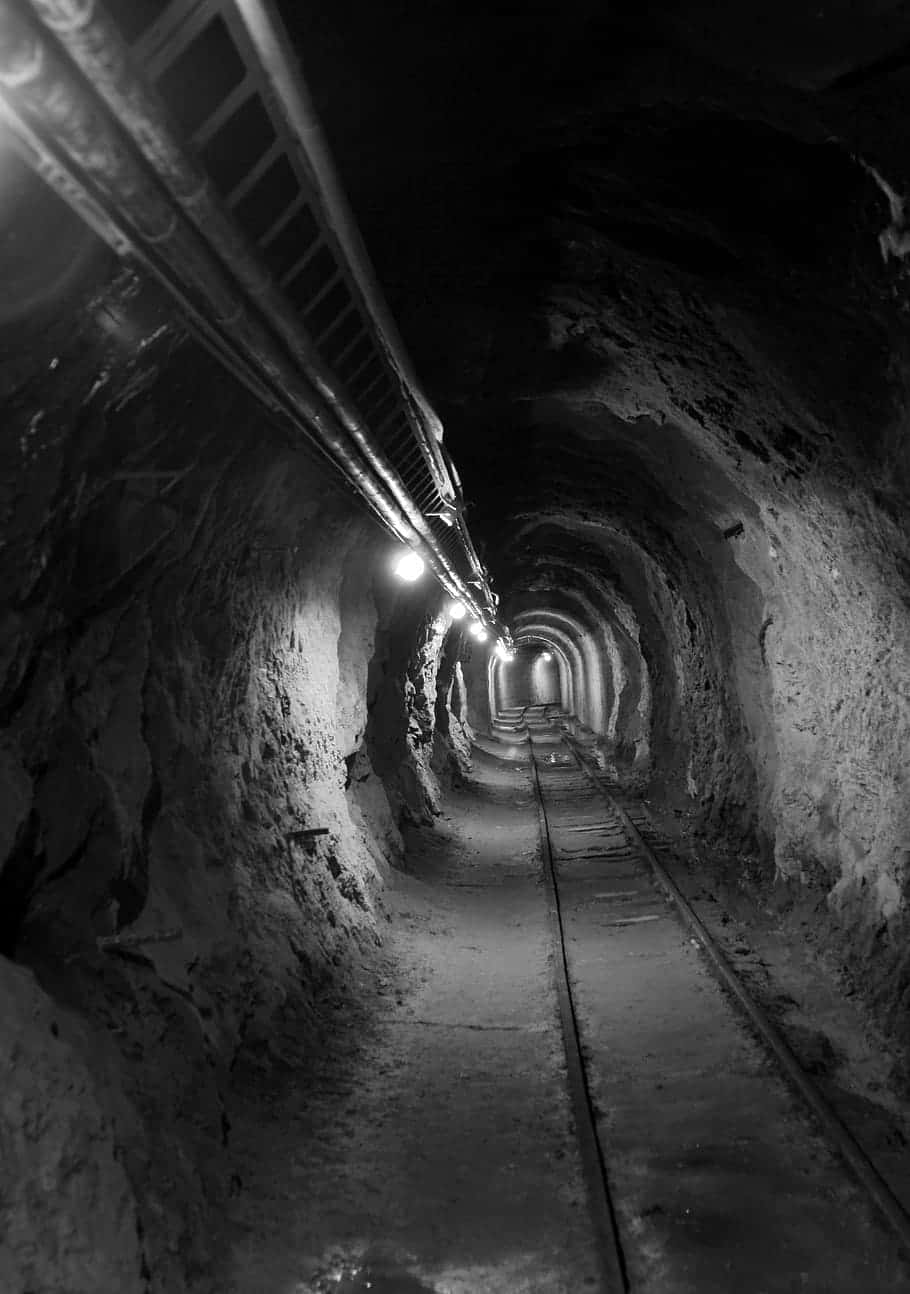 Dimly_ Lit_ Mining_ Tunnel Background