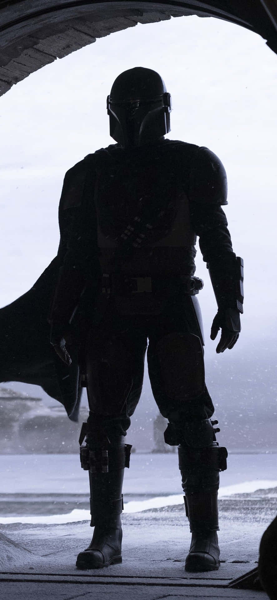Din Djarin Under An Arch The Mandalorian Iphone Background