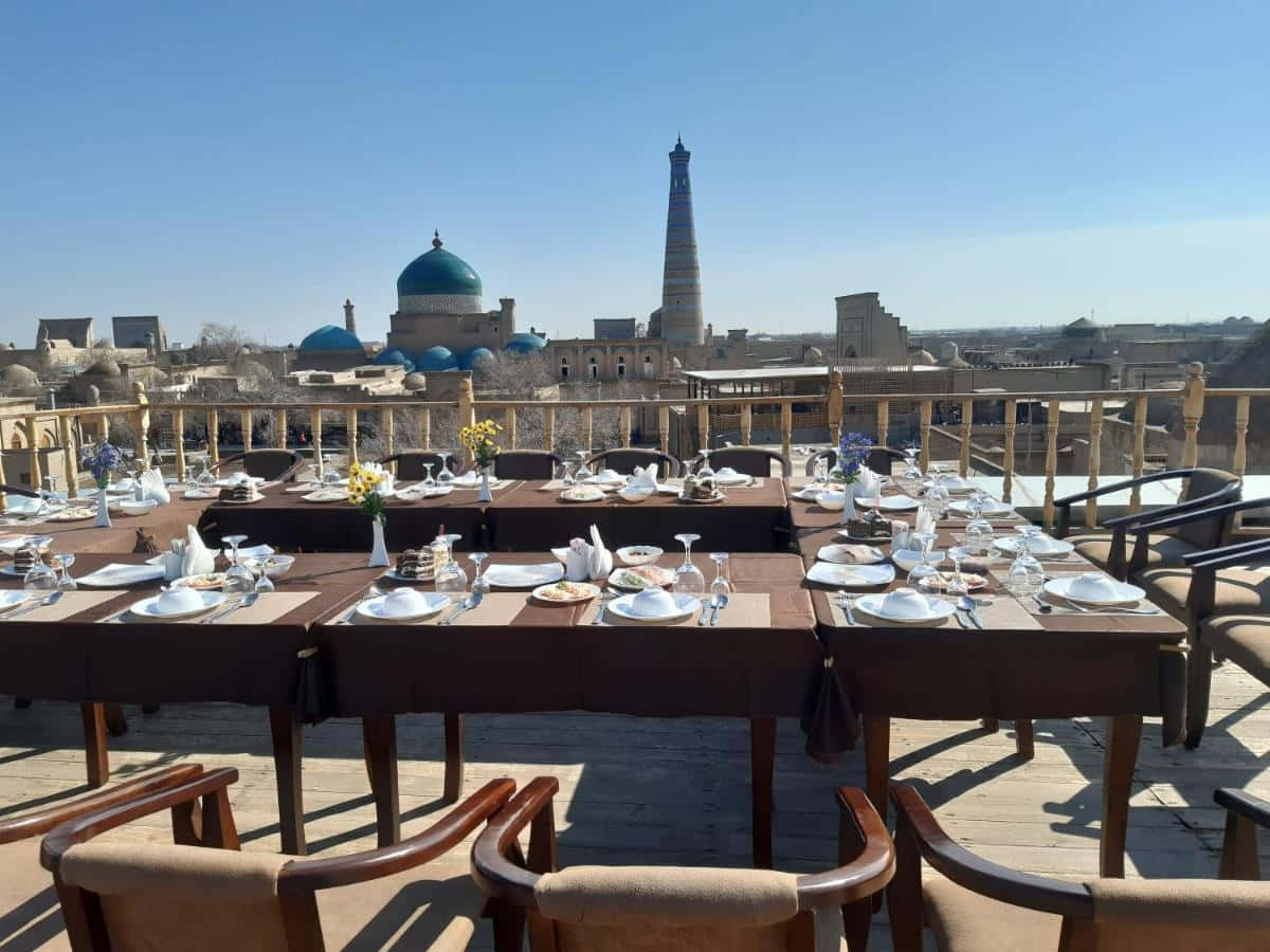 Dine In Luxury - Traditional Dining Area In Khiva Background