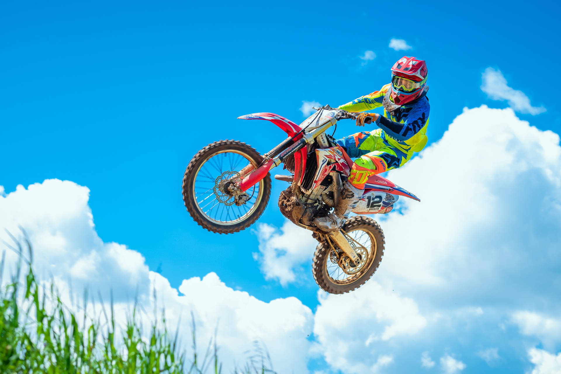 Dirt Bike And Clouds Background