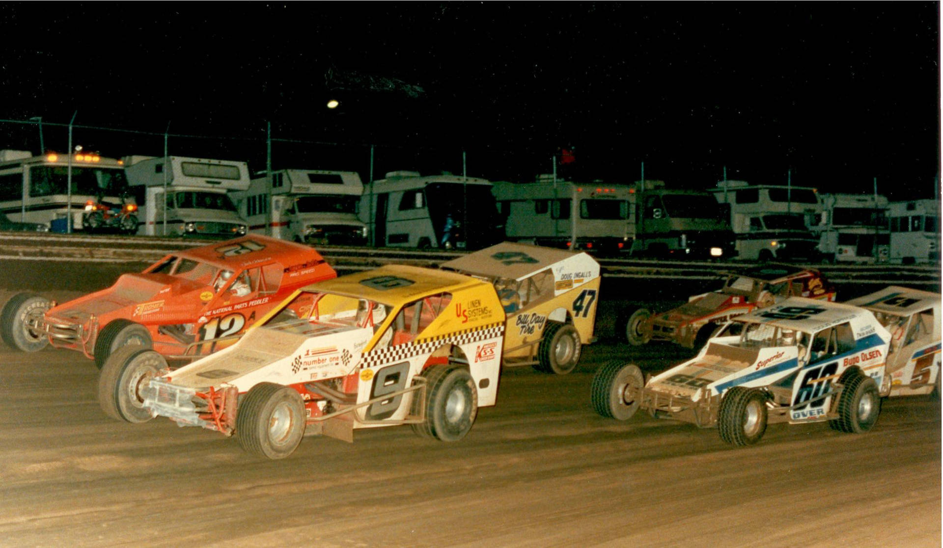 Dirt Car Racing Down A Country Road Background