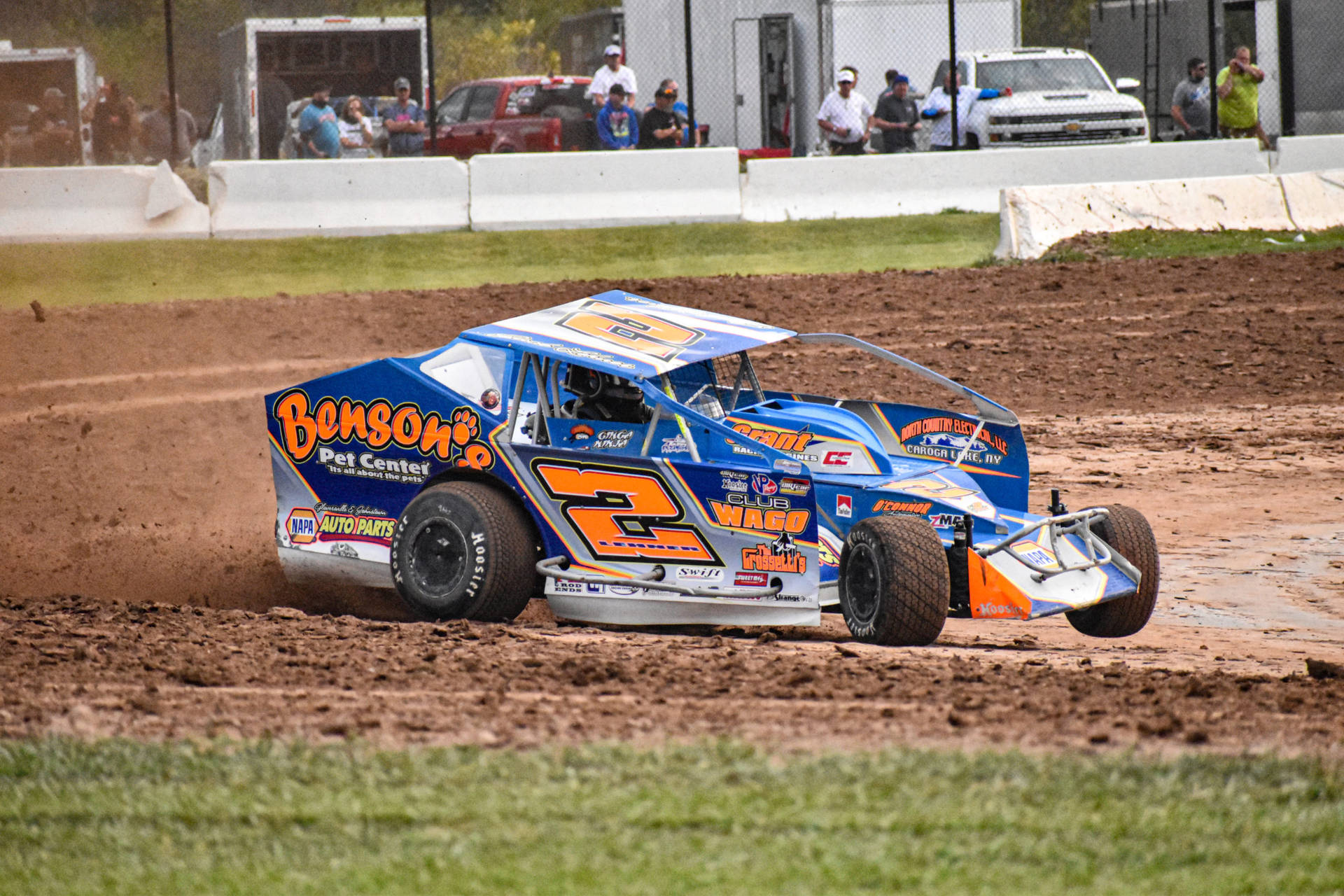 Dirt Car Racing On Dirt Track Background