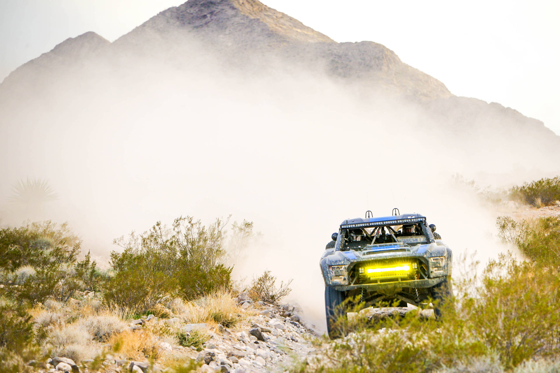 Dirt Rally Car With Yellow Headlamp
