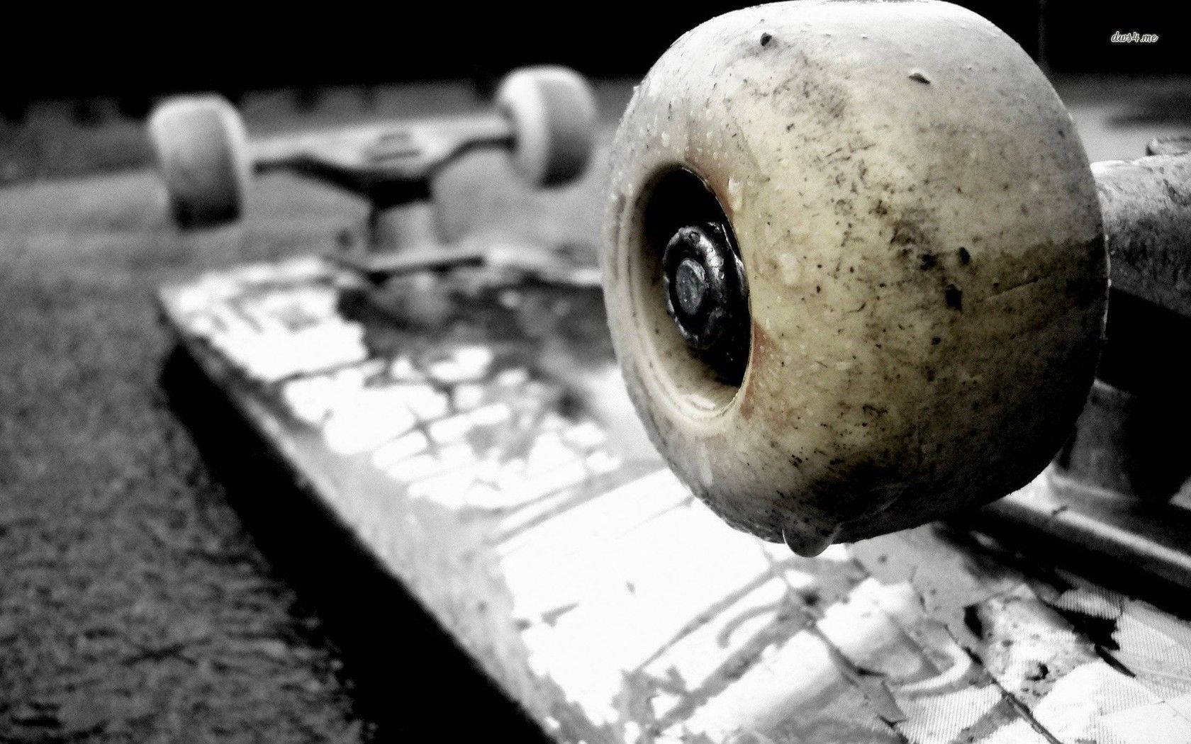 Dirty Wheels Of Skateboard Background