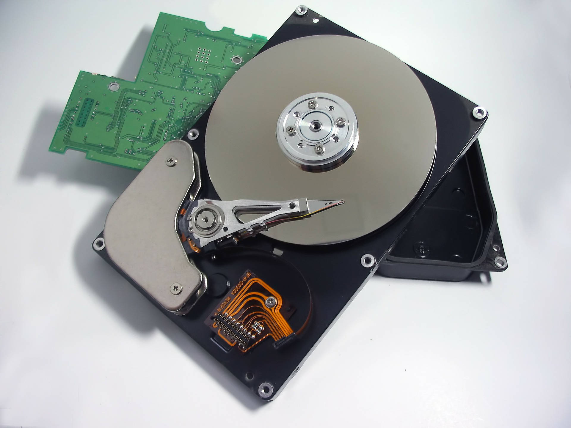 Disassembled Hard Drive From A Top View Perspective.