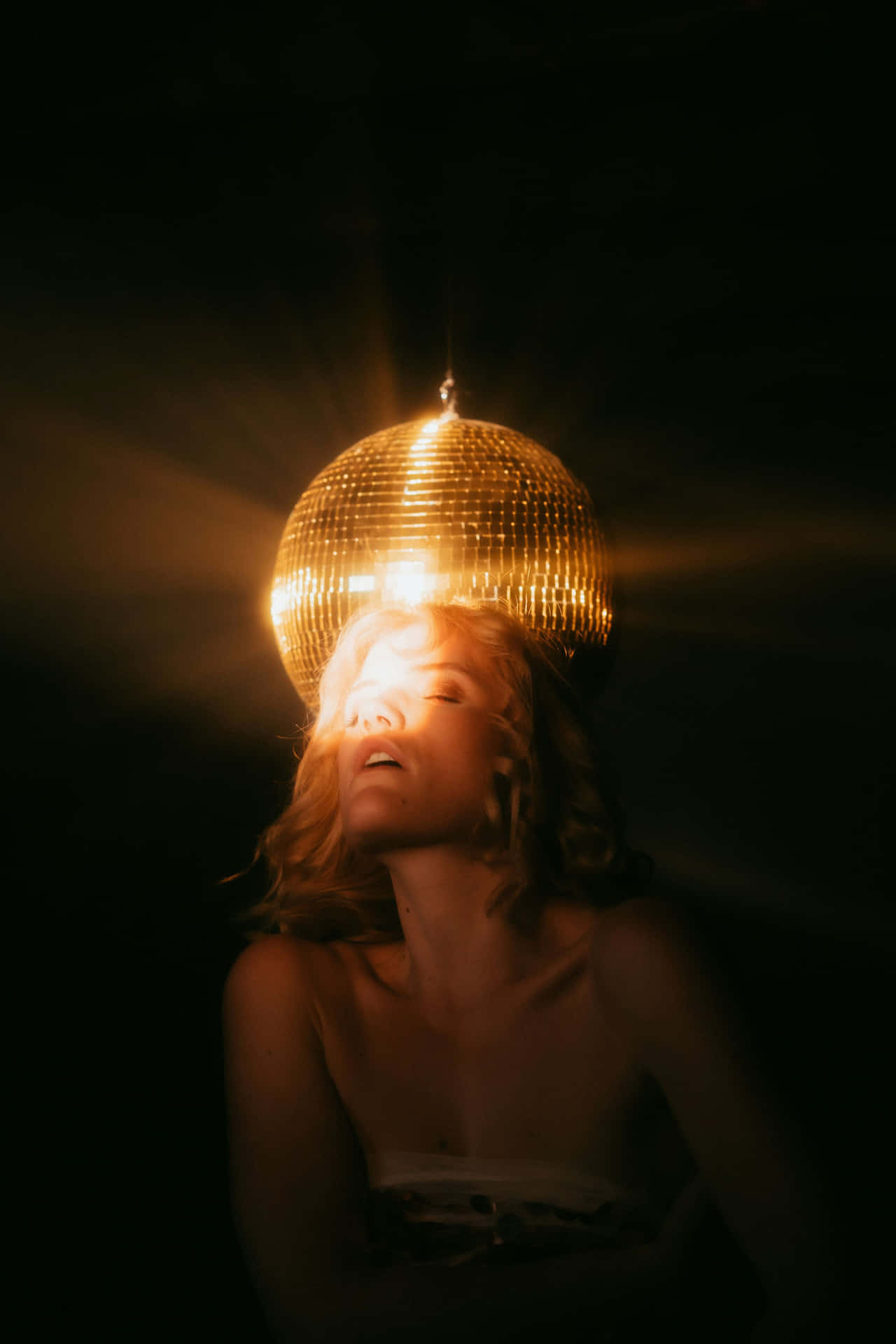 Disco Inspired Portraitwith Mirror Ball Hat Background