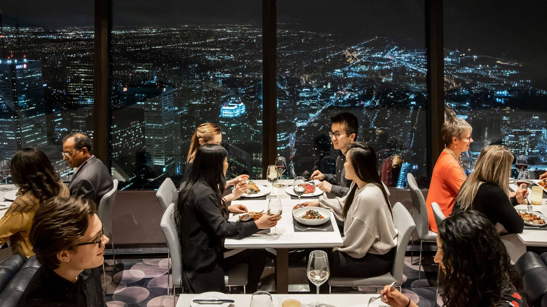 Discover The Breathtaking View From Cn Tower's Revolving Restaurant Background