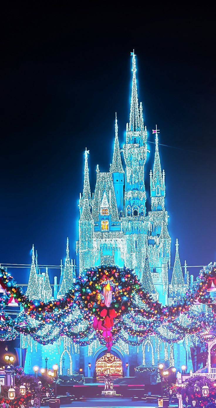 Disney Christmas Castle With Blue Lights Background
