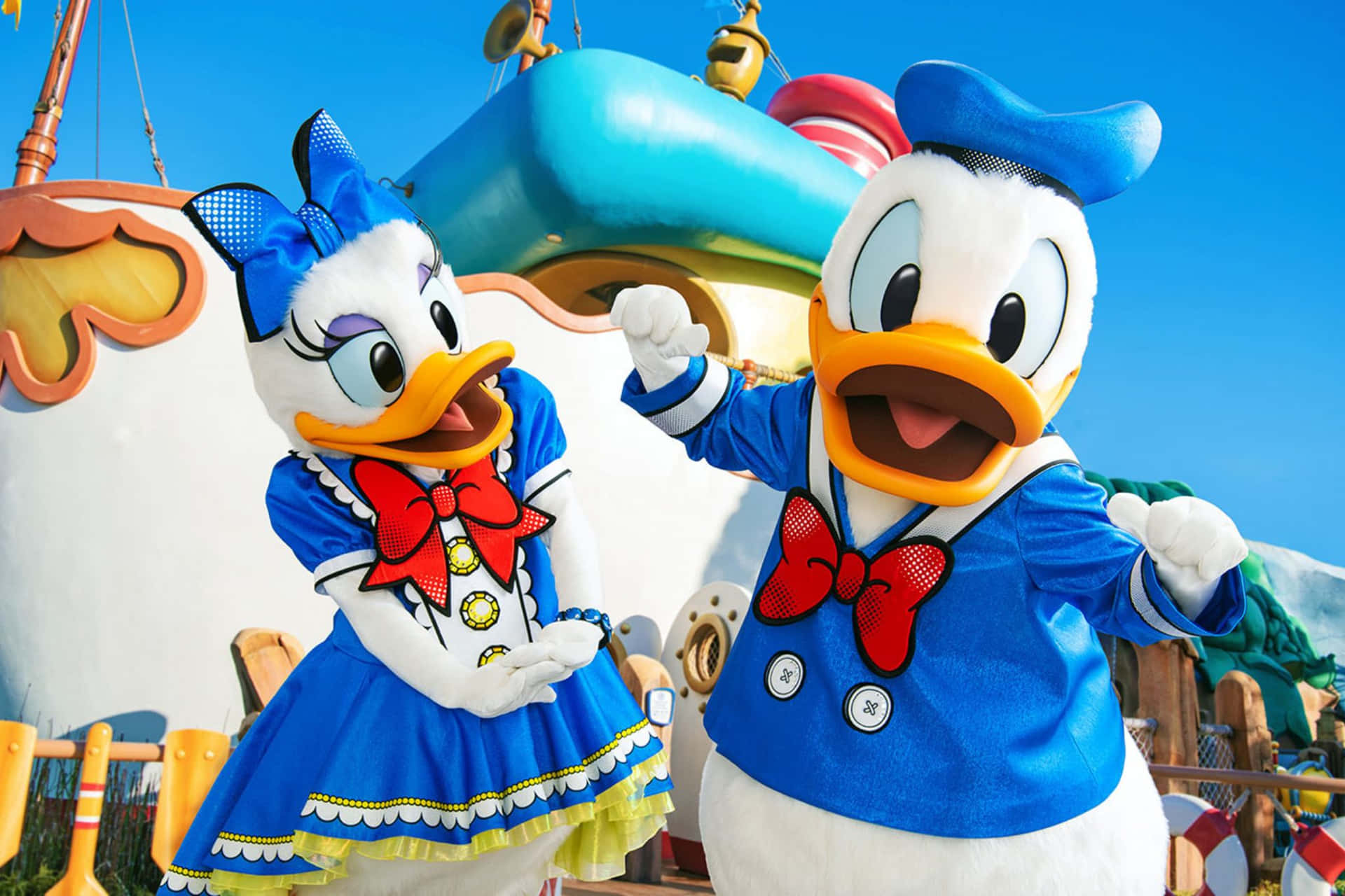 Disney Daisyand Donald Duck Costumed Characters Background