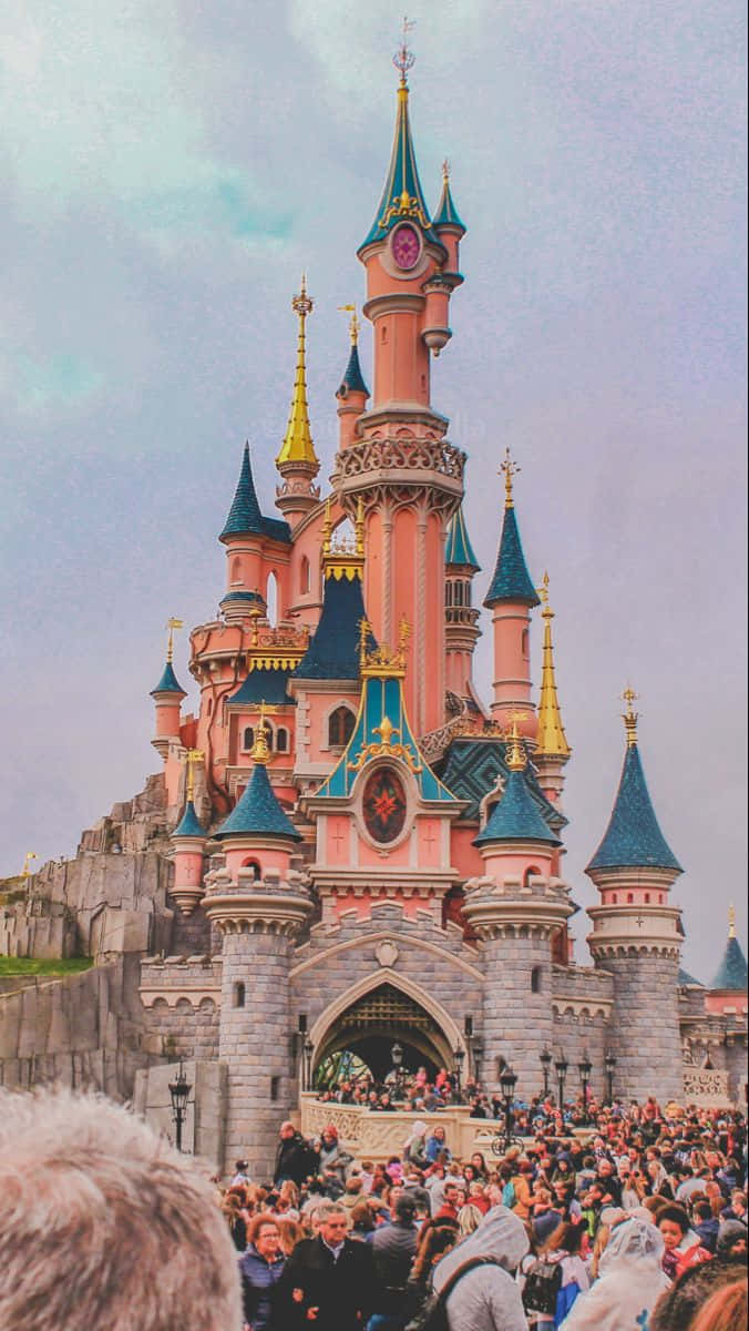 Disneyland Paris With Tourists Packed Together Background