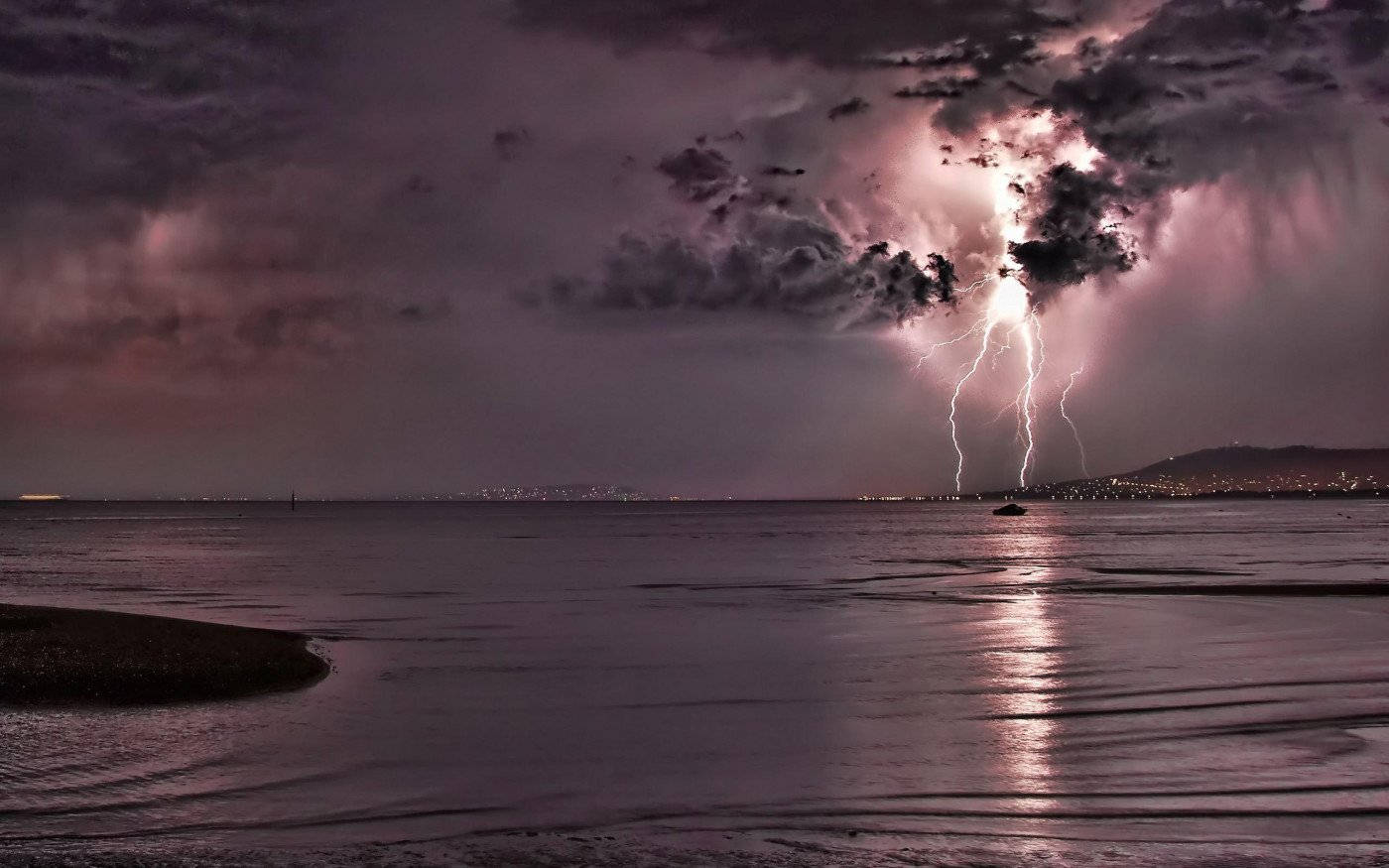 Distant Thunderstorm From Ocean Background