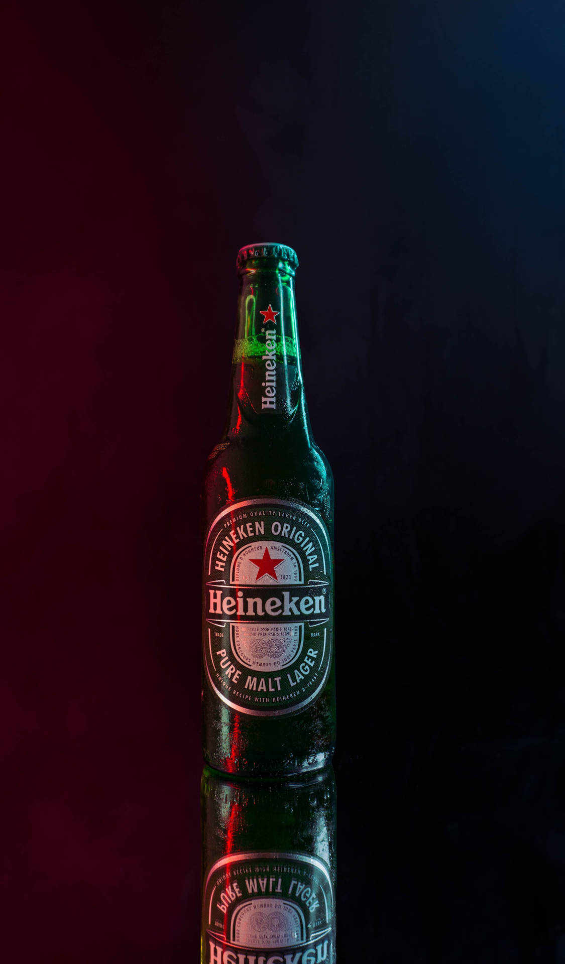 Distinctive Heineken Beer Bottle Against A Cinematic Backdrop Background