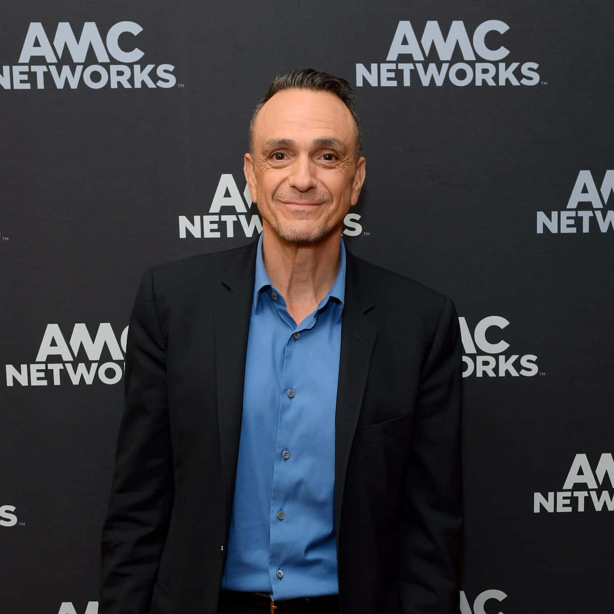 Distinguished Actor Hank Azaria Posing Elegantly Background
