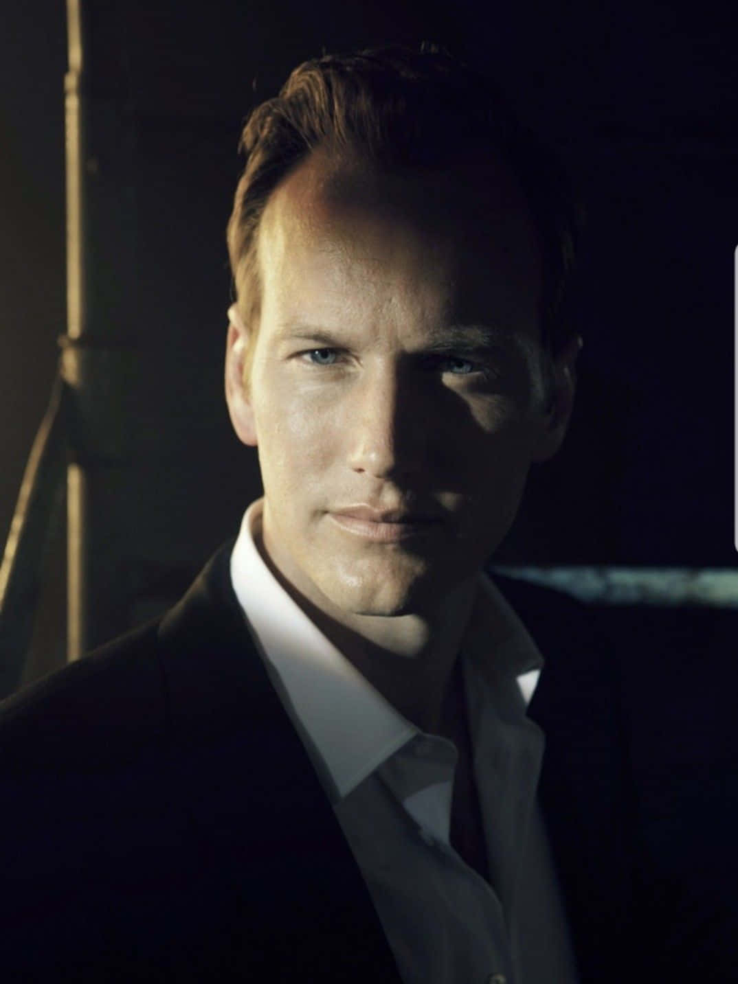 Distinguished Actor Patrick Wilson Looking Thoughtful In A Casual Outfit. Background