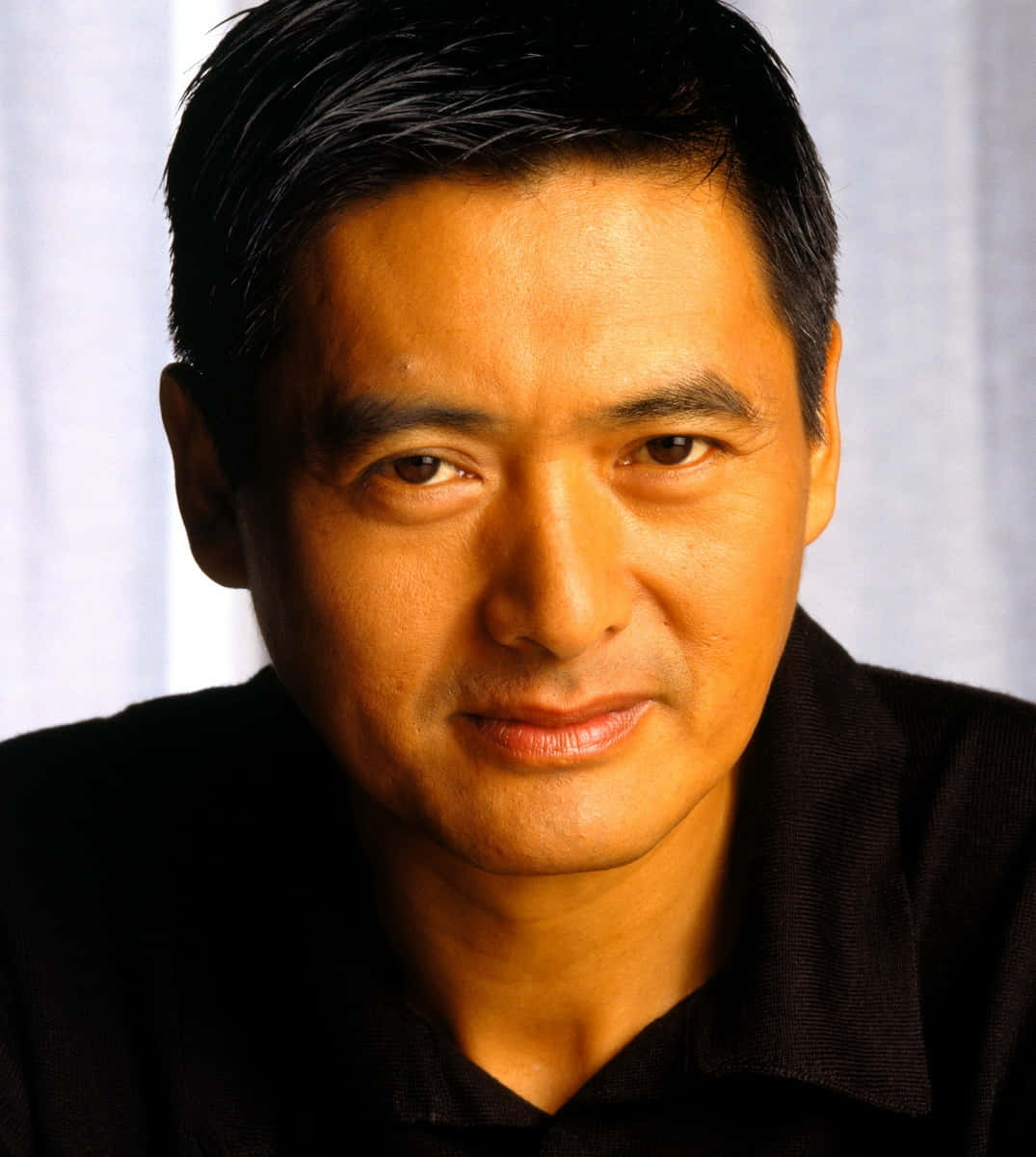 Distinguished Hong Kong Actor Chow Yun-fat In A Contemplative Pose. Background