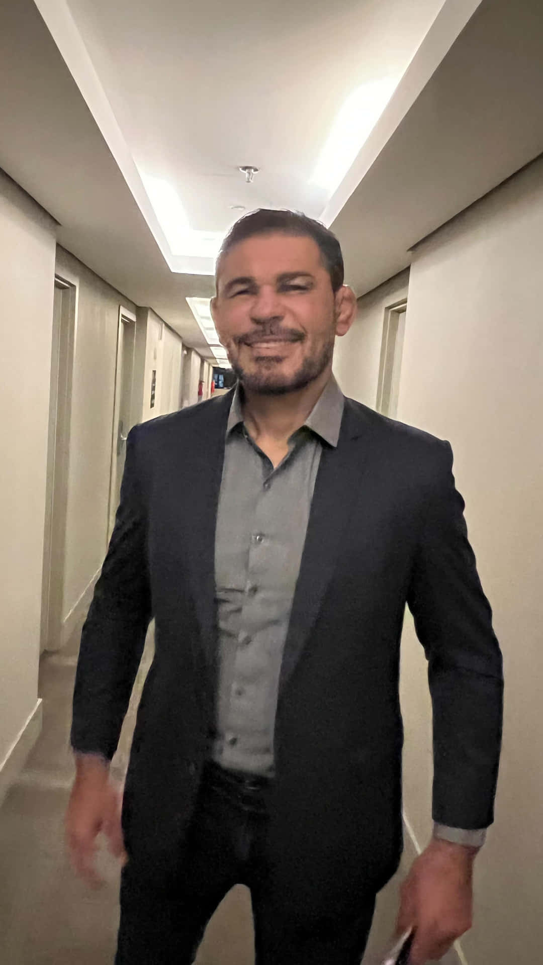 Distinguished Mma Fighter Antônio Rodrigo Nogueira In A Formal Suit Background