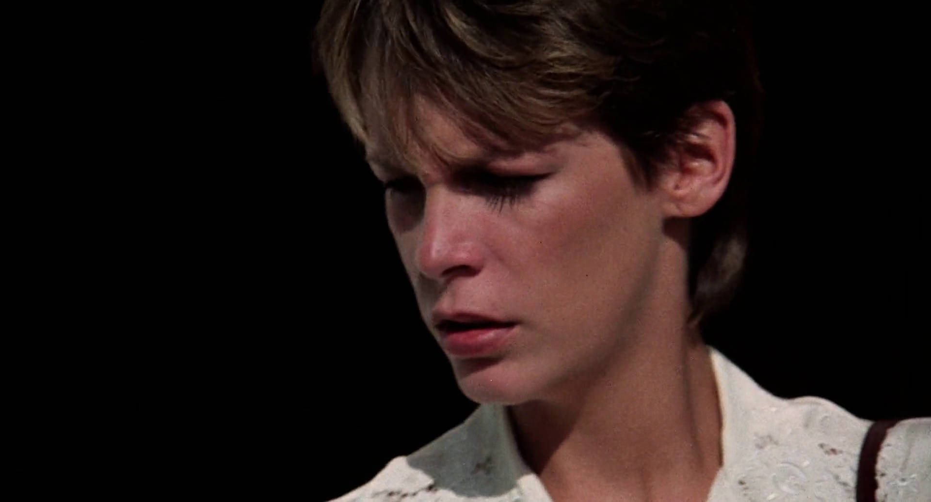 Distressed Jamie Lee Curtis As Anna Background