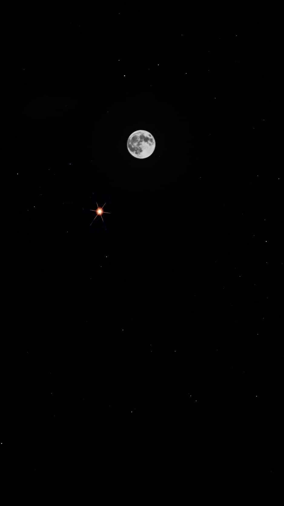 Dive Into A Star-studded Evening With Moon Iphone Background