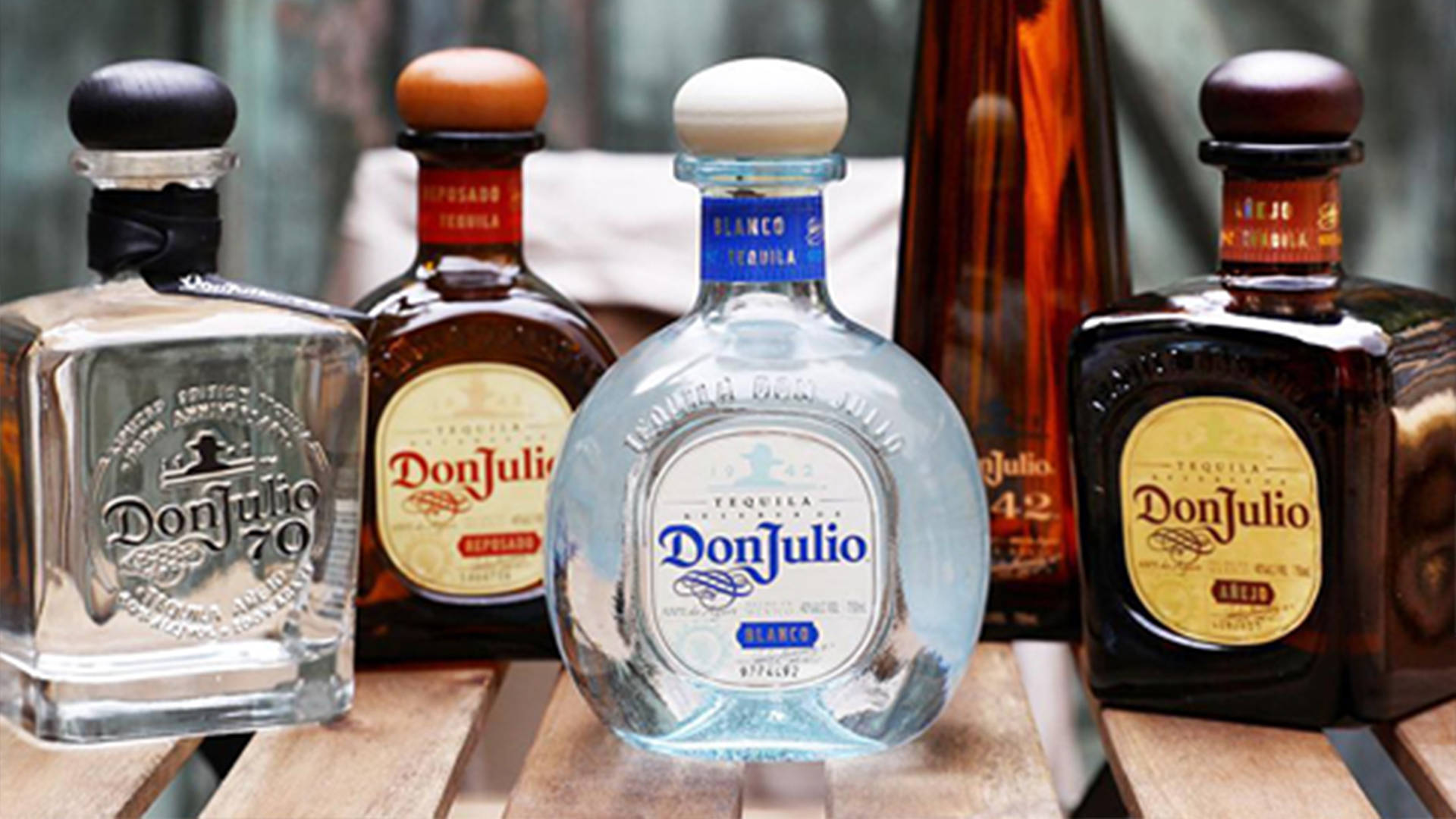 Diverse Collection Of Don Julio Tequila On Display