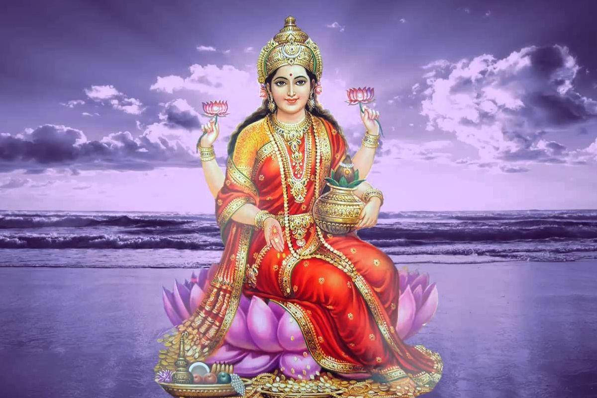 Divine Beauty Of Lakshmi With Purple Lotus Background