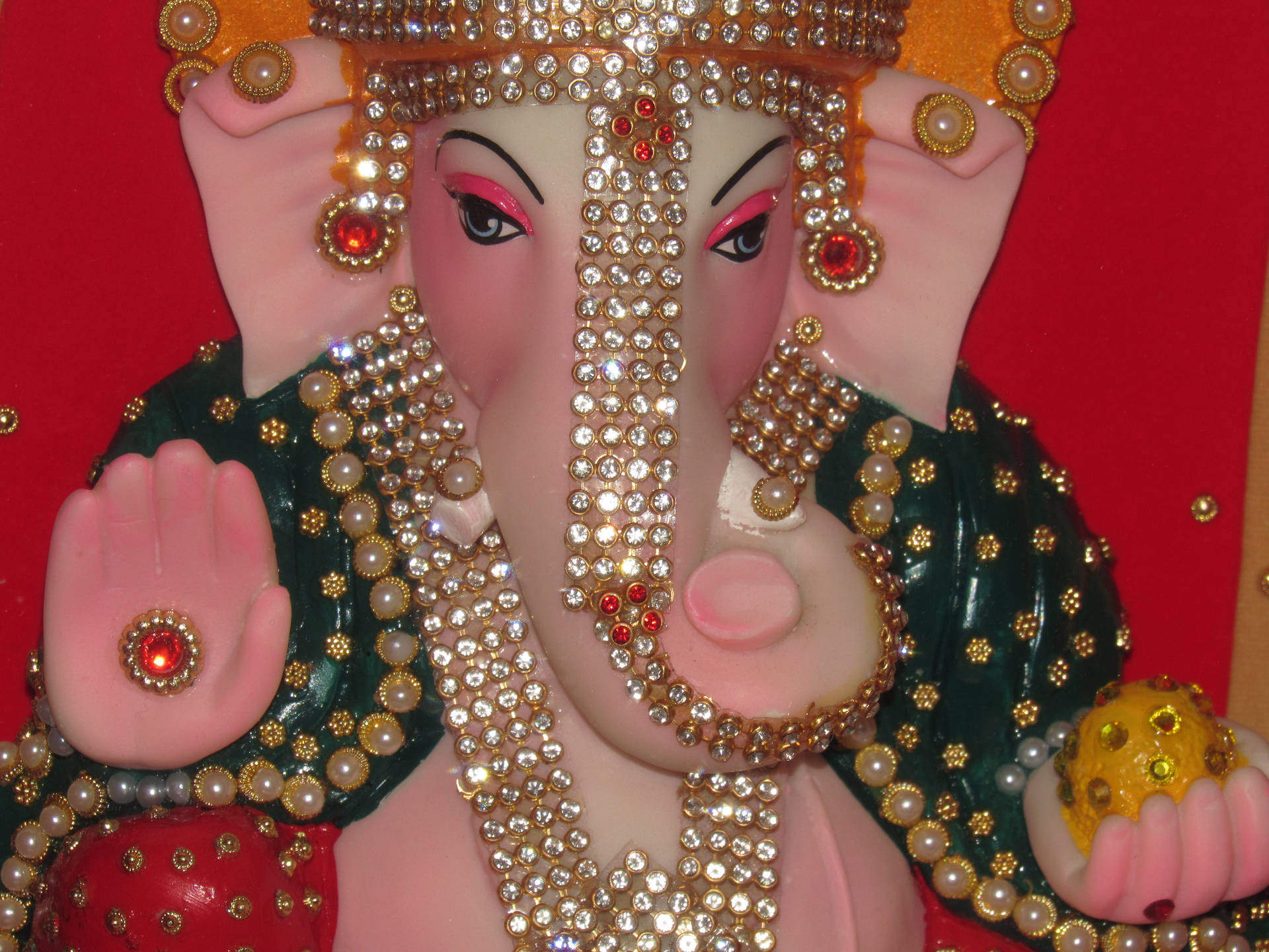 Divine Bejeweled Statue Of God Ganesh Background