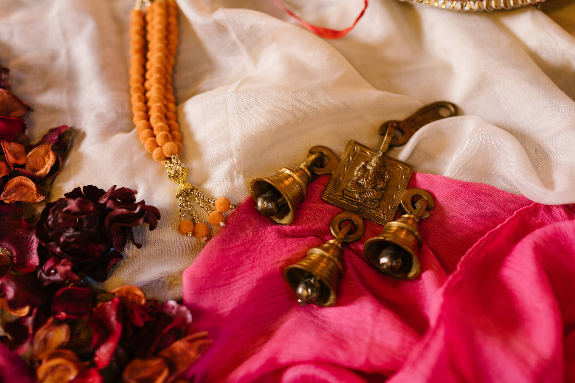 Divine Brass Ganesh 4k With Hanging Bells Background