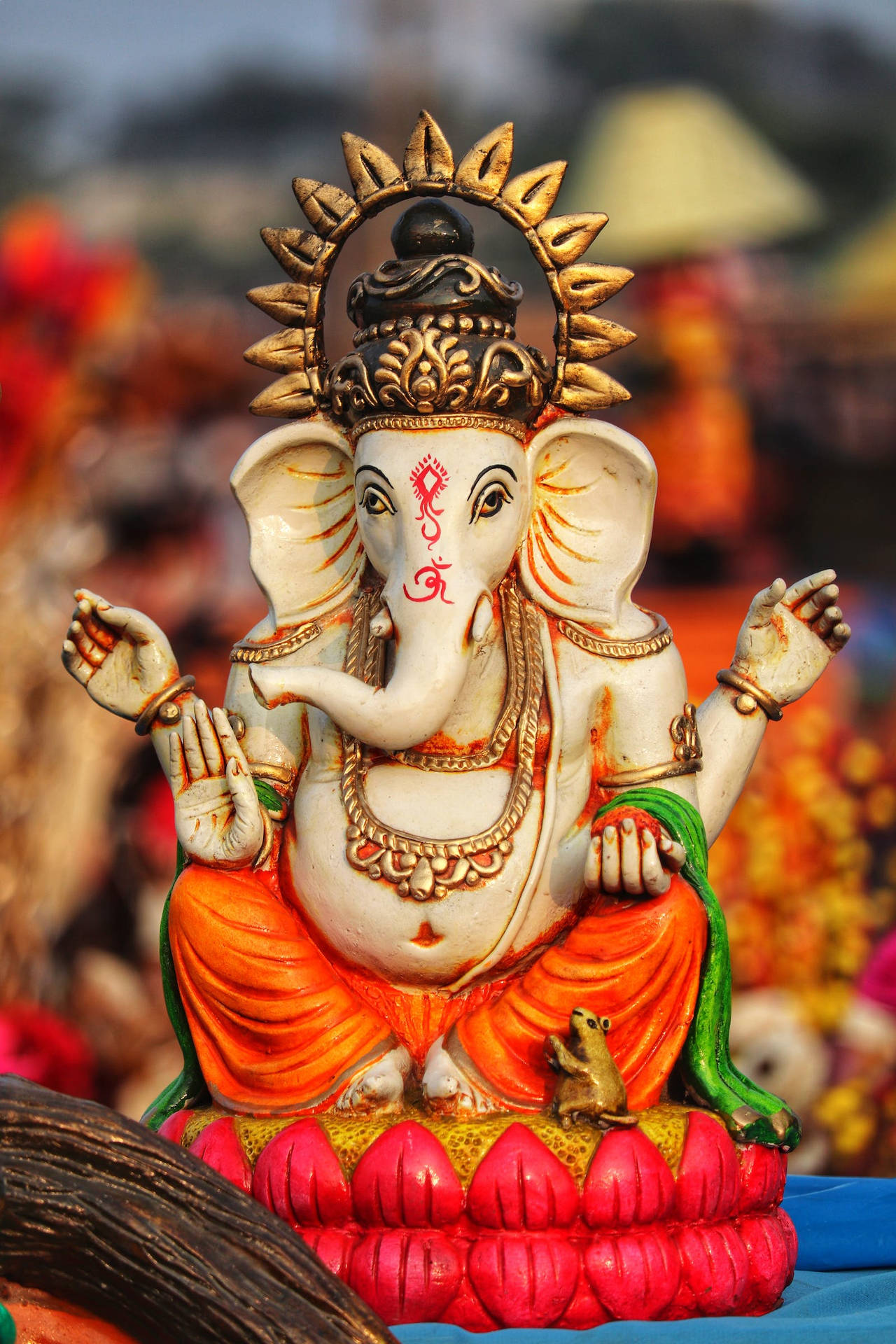 Divine Ganesha Figurine In Spectacular Detail Background