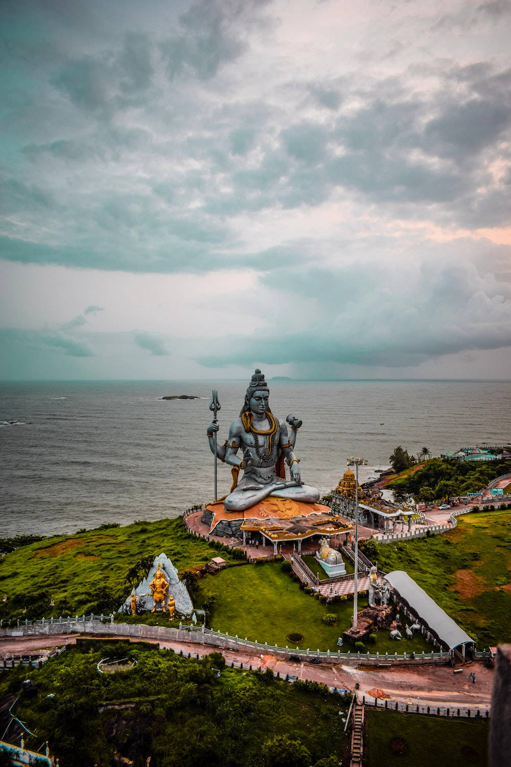 Divine Glimpse Of Bholenath - Lord Shiva By The Seaside Background