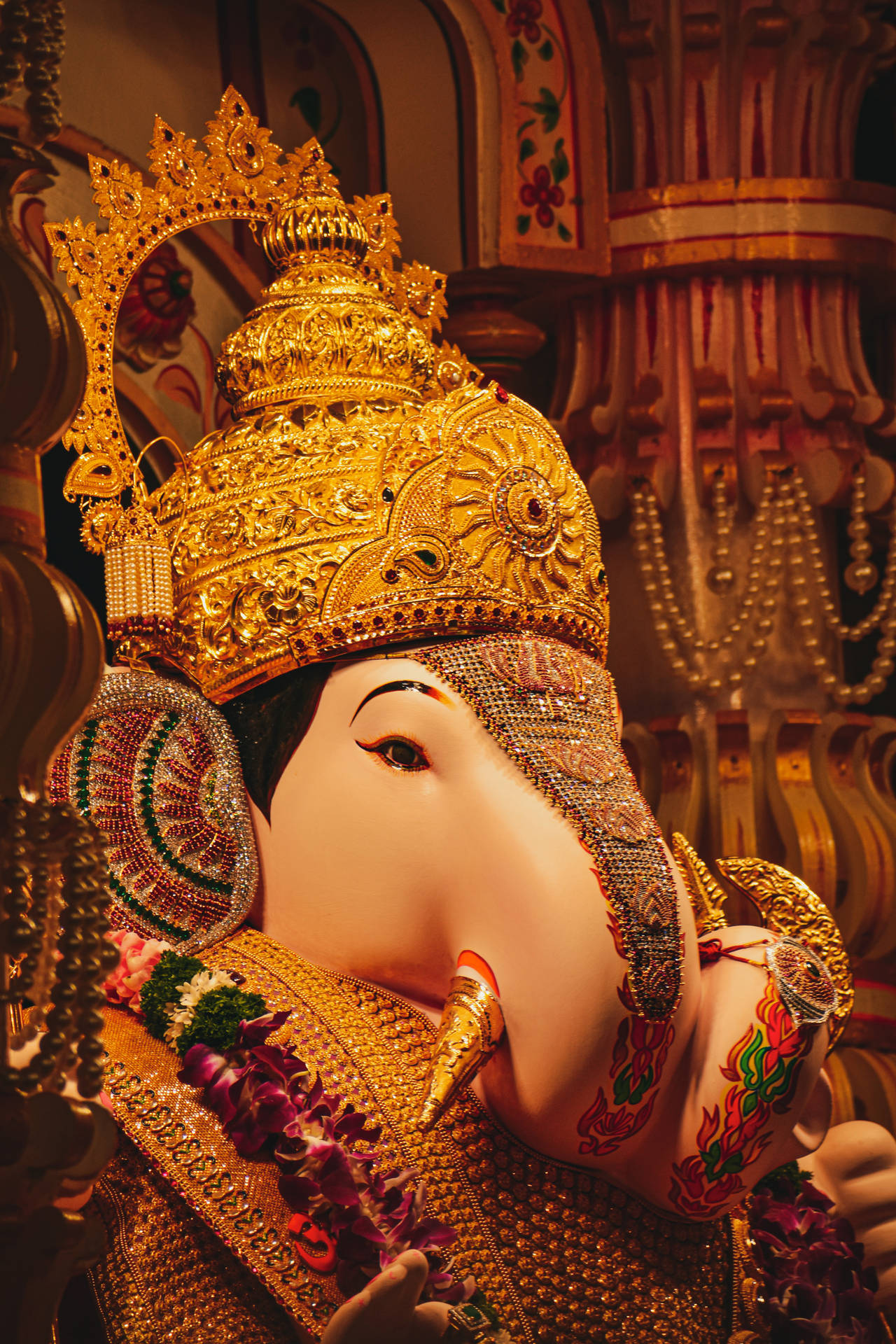 Divine Glittering Ganesh On Mobile Background