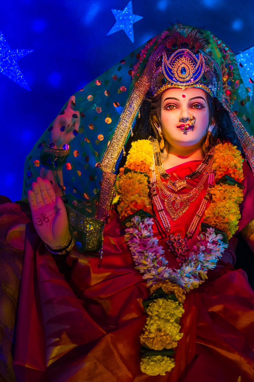Divine Glow Of Vaishno Devi Amidst The Starlit Sky