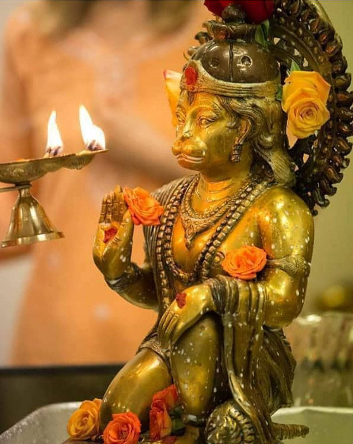 Divine Jai Hanuman Statue On Vibrant Background