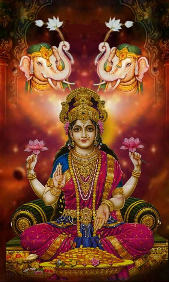 Divine Lakshmi Adorned By Elephants And Lotus Background