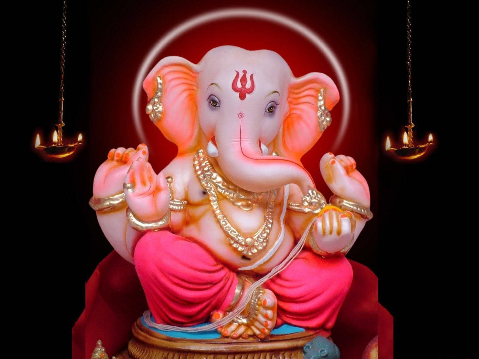 Divine Marble Statue Of Lord Ganesh Background