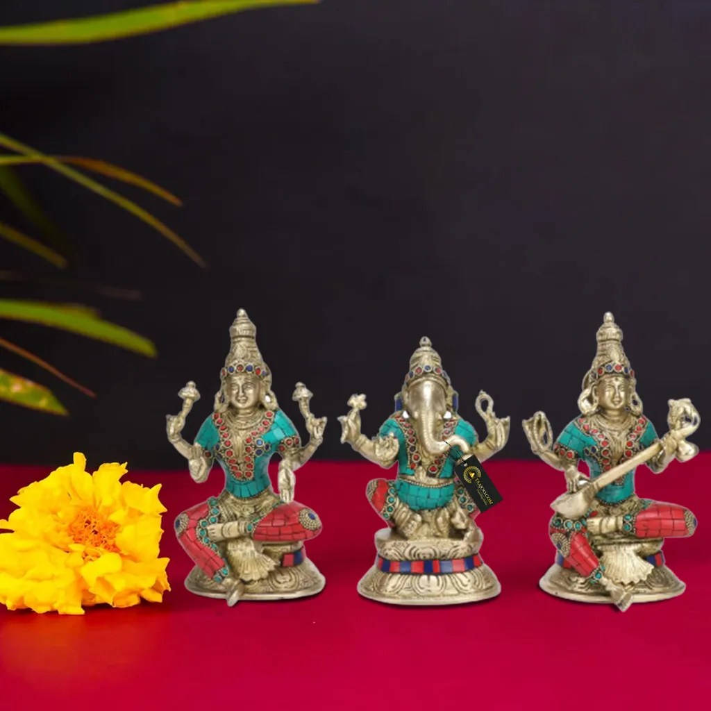 Divine Trio - Silver Figurines Of Laxmi, Ganesh, And Saraswati Background