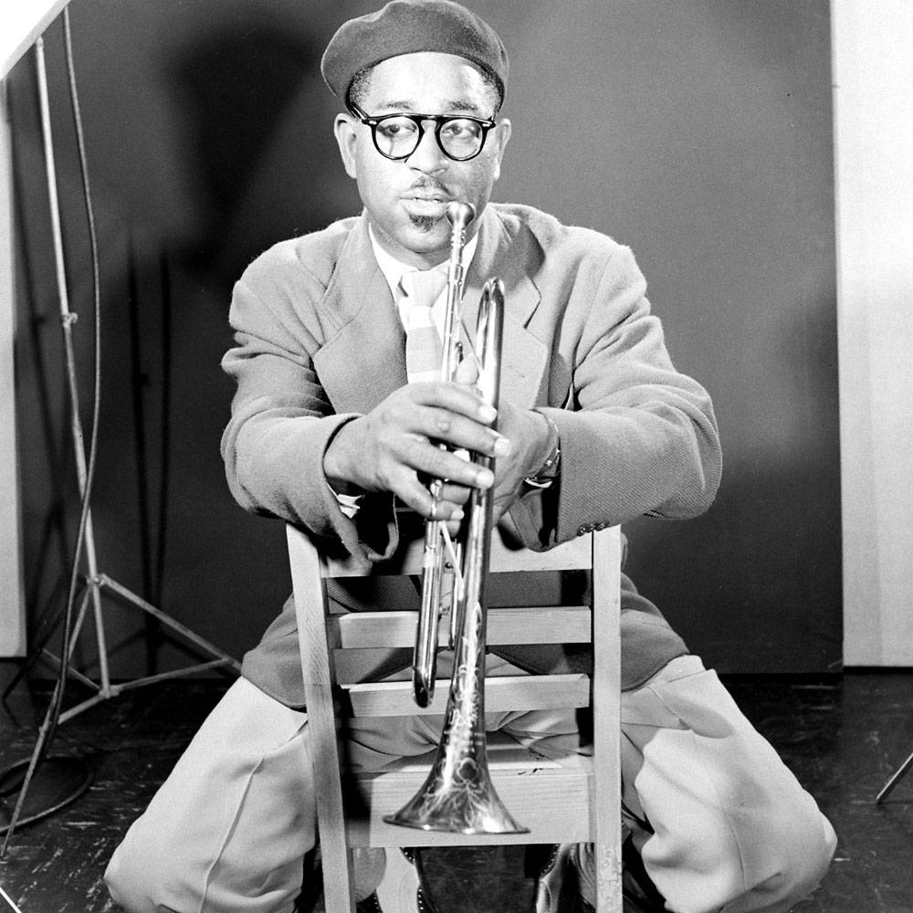 Dizzy Gillespie Immersed In Jazz Background