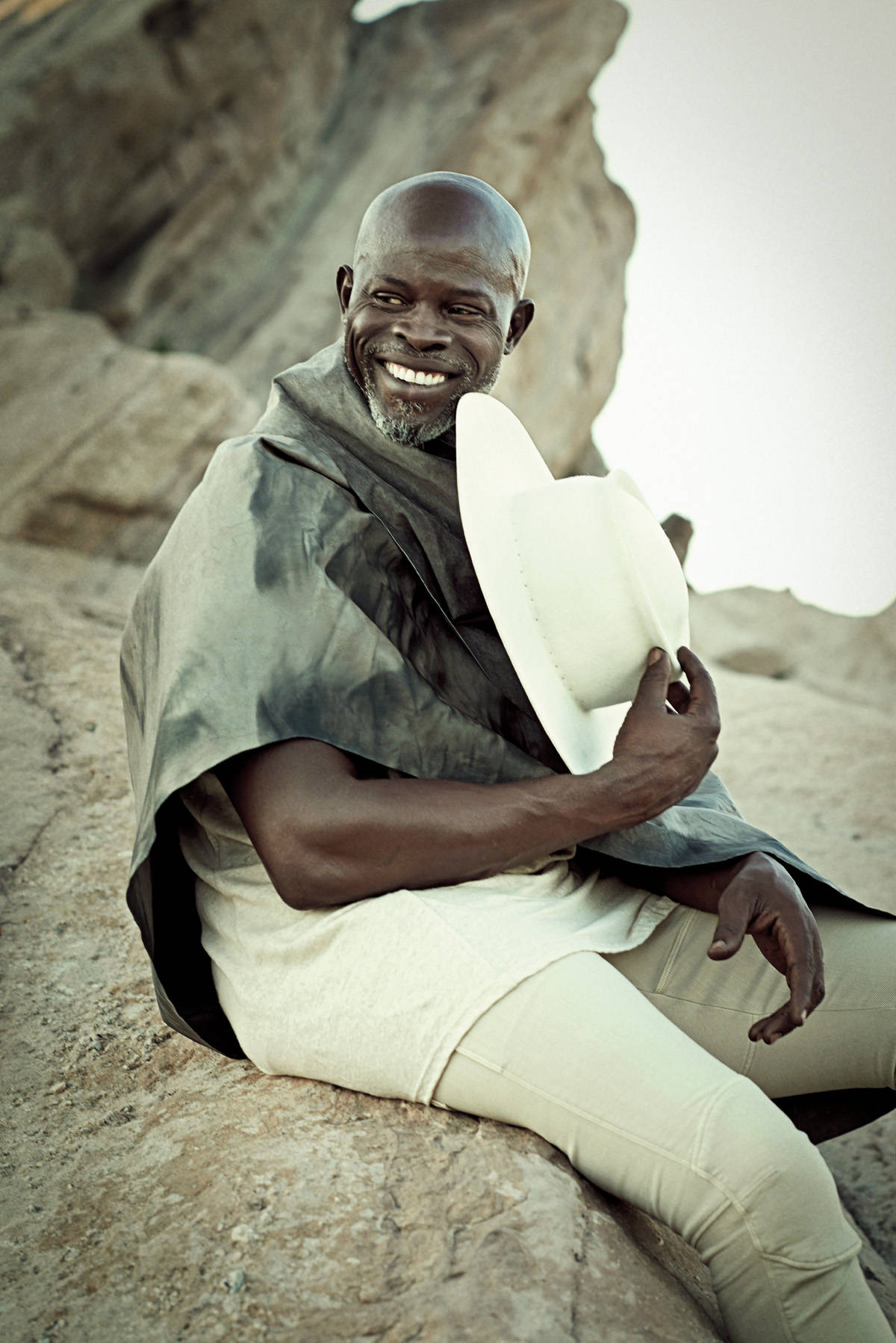 Djimon Hounsou On Rock Background