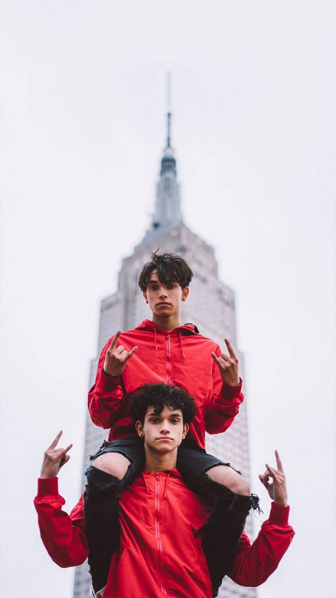 Dobre Brothers In Red Jackets Background