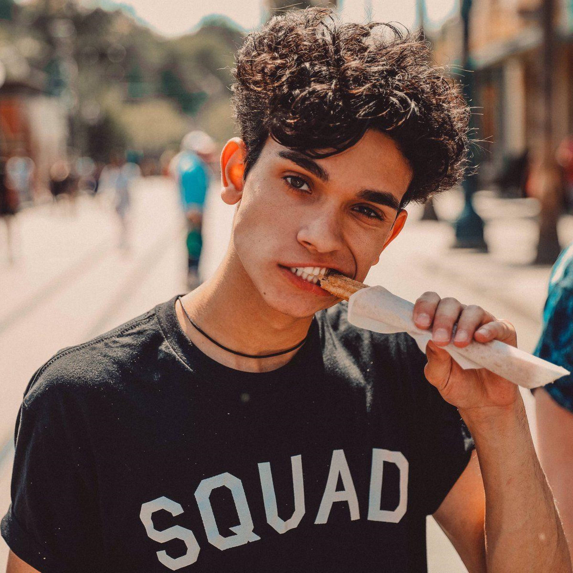 Dobre Brothers Marcus Eating Churros Background