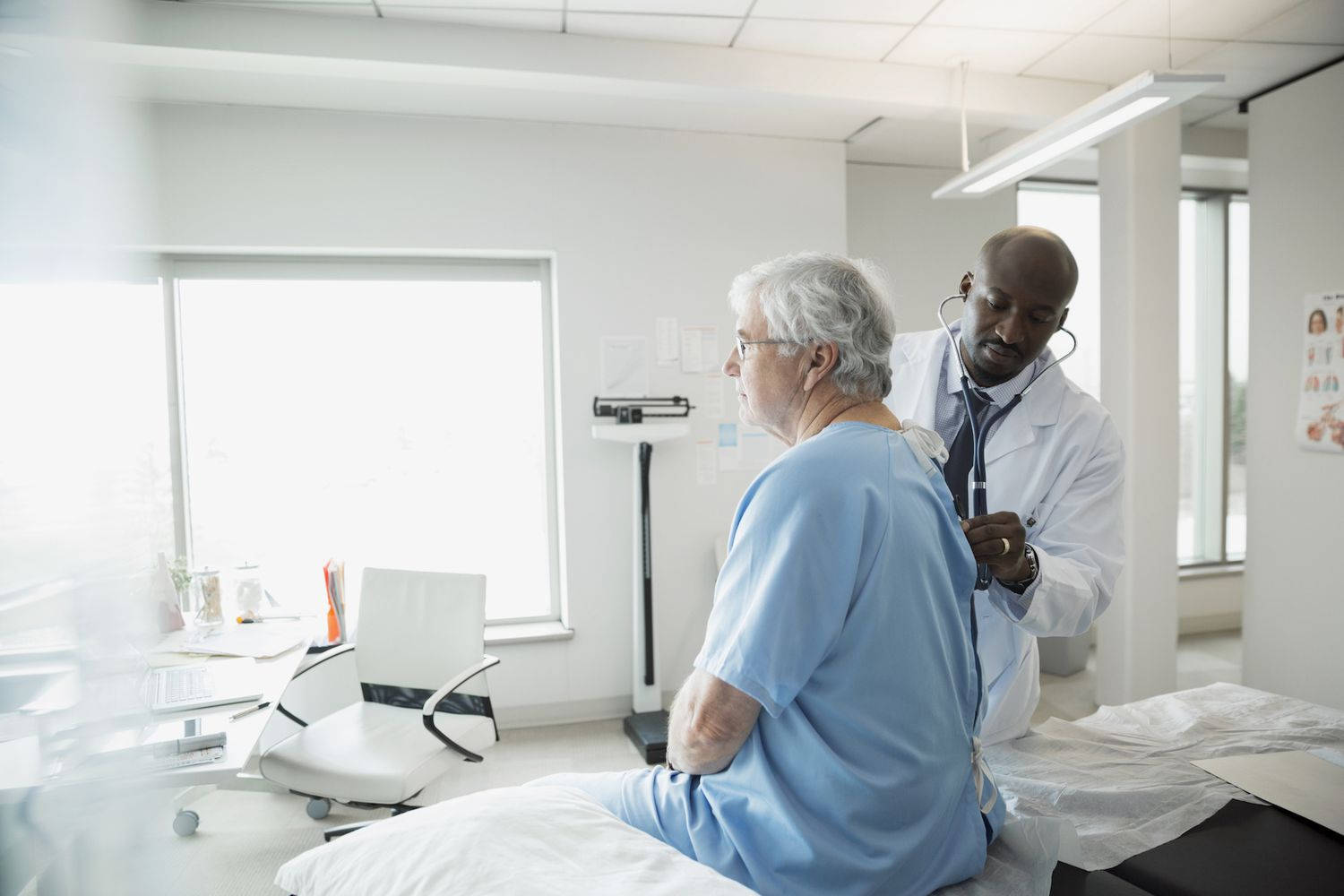 Doctor Checking Patient's Heartbeat Background